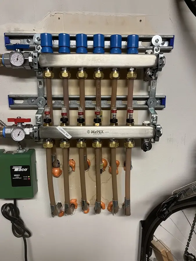 Plumber performing Water Heater Repair at a residential property in Cresskill